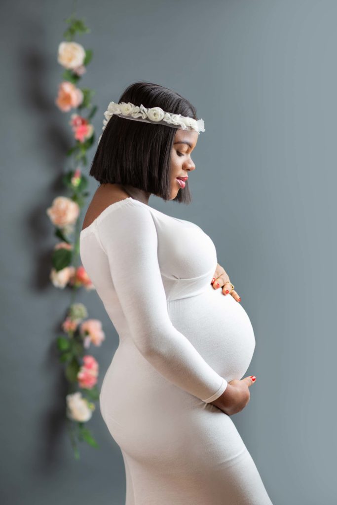 maternity portrait in a white dress