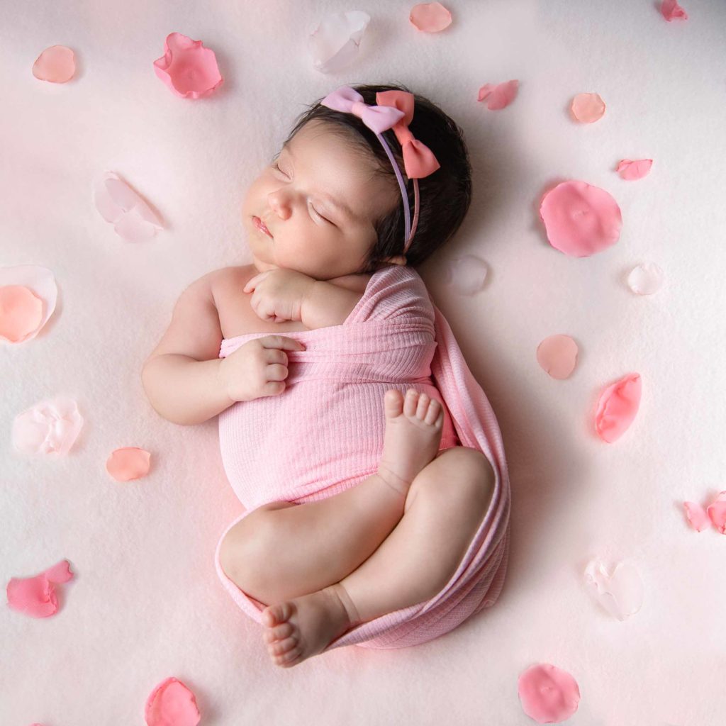 newborn baby in pink