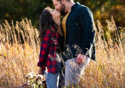 kissing couple in the grass