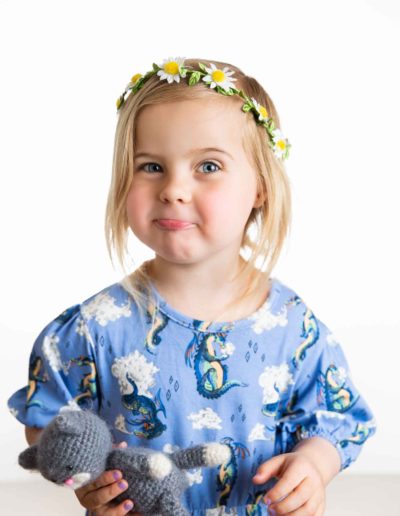 preschool girl making funny faces