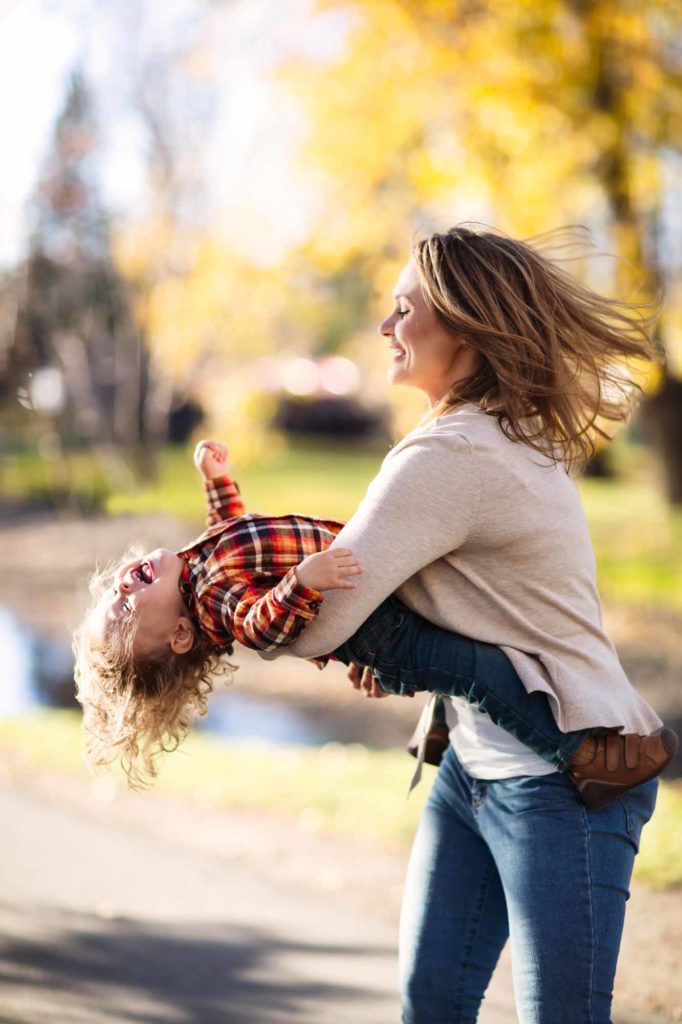 mom and baby playing in the park