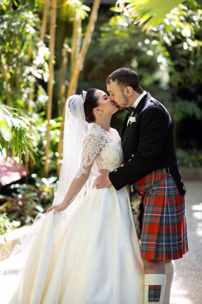 Bride and groom kissing