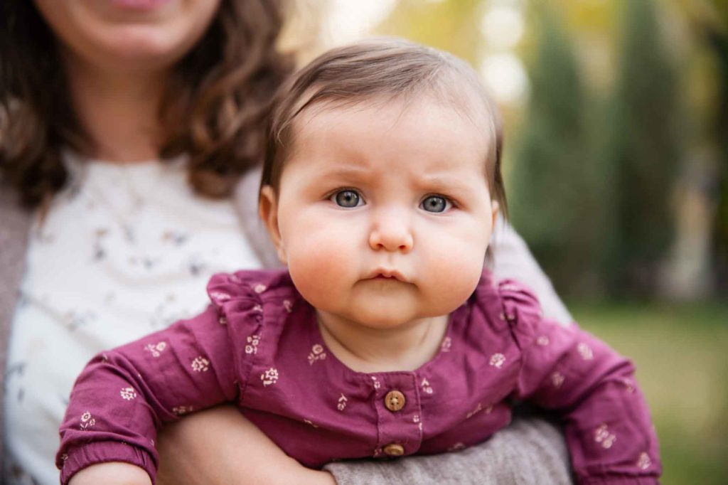 baby in mother's arms