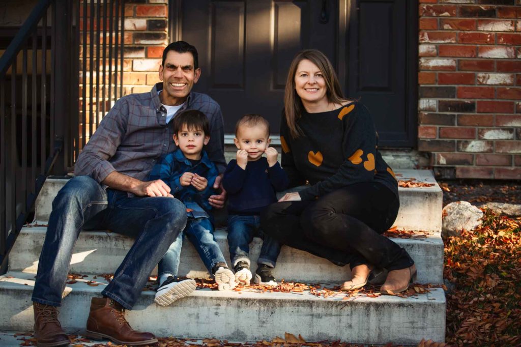 young family on the porch