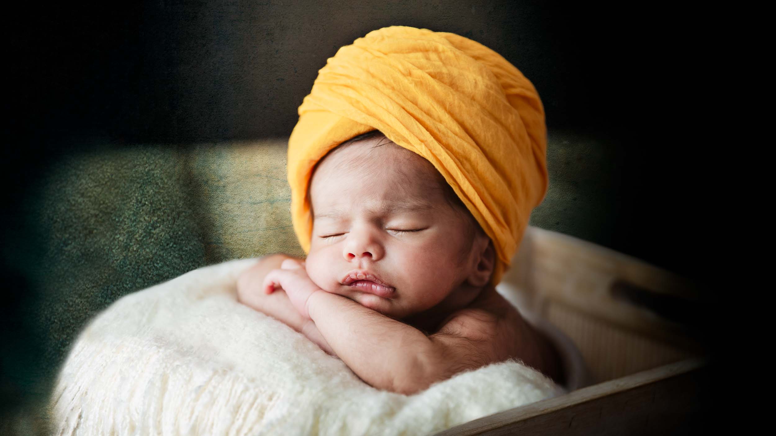 Indian-themed-newborn-session newborn baby in an indian turban