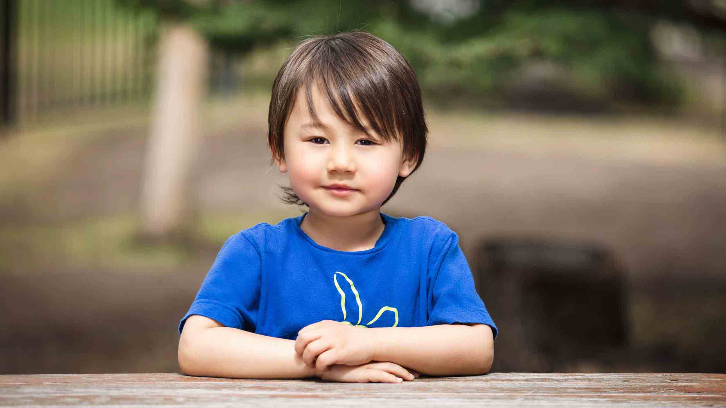 preschool kid sitting at a table