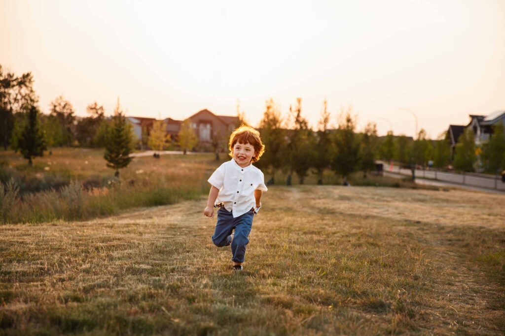 child running on a field
